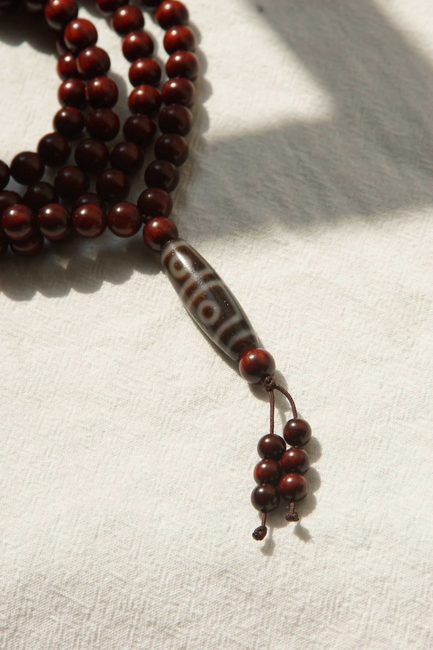 Rosewood & Four-eyed Dzi Mala