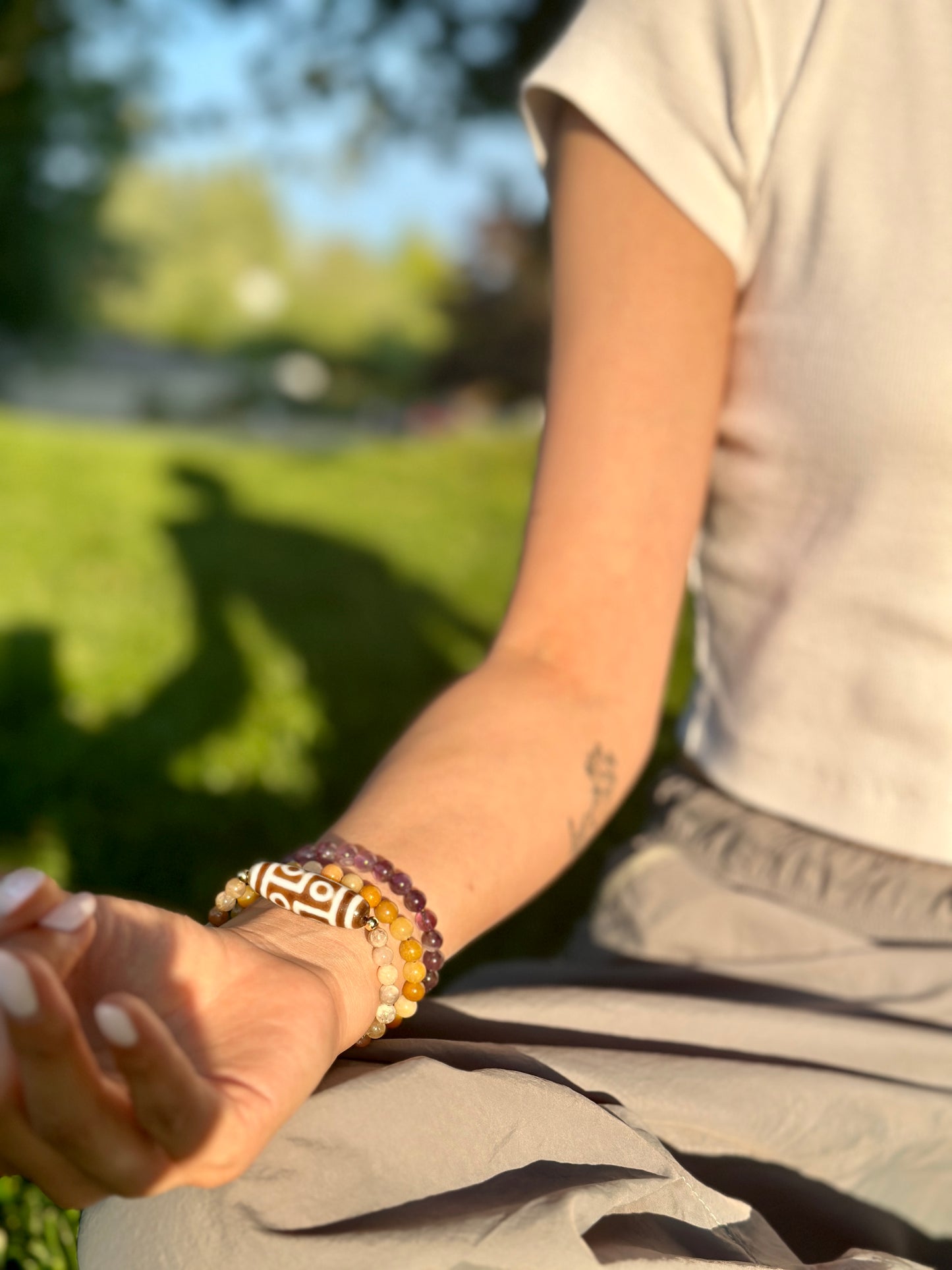Six-Eyed Dzi Bead and Sunstone Bracelet
